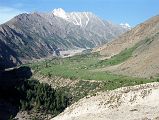 12 View Ahead To Rupal Village And Way Towards Nanga Parbat Rupal Face Base Camp From Tarashing The trek from Tarashing climbs over the Tarashing Glacier with a view of the Rupal Village ahead.